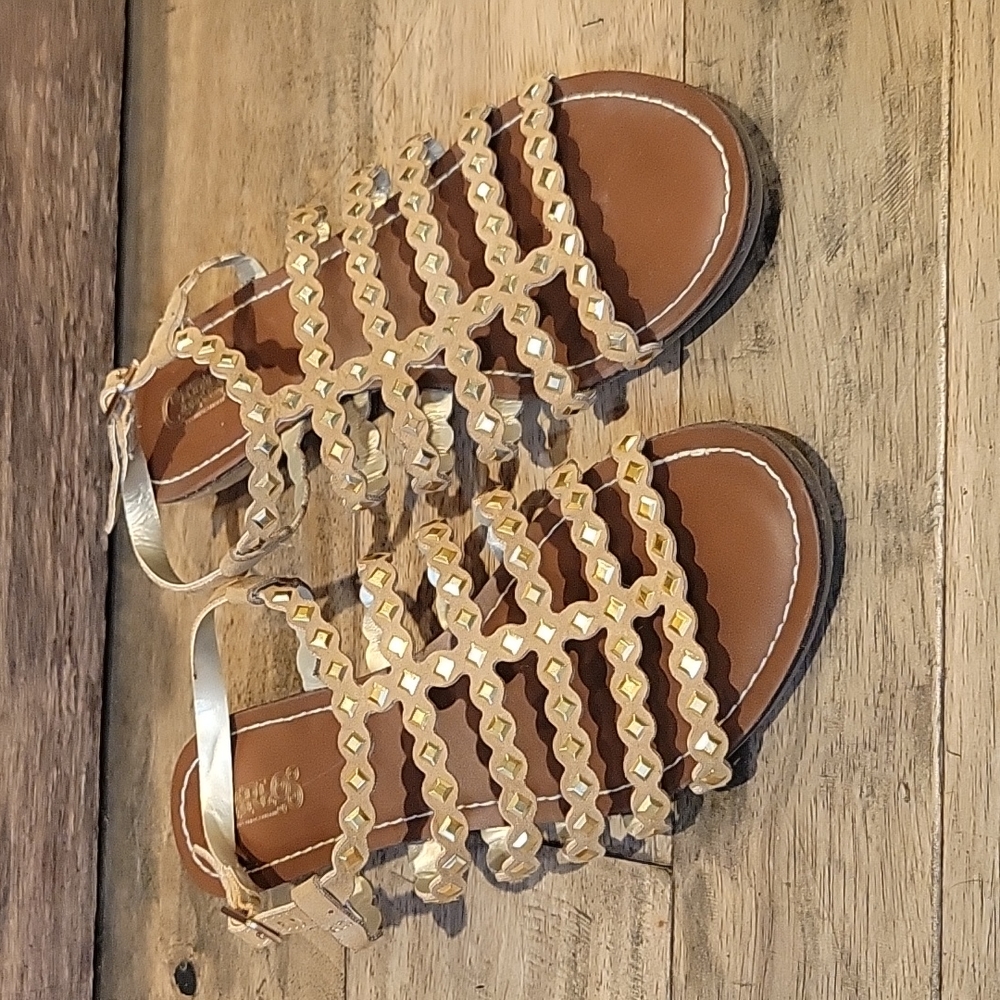 Tan sandals with gold accent. Size 7